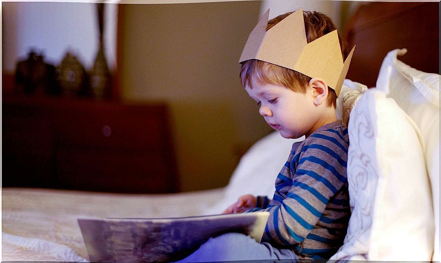 Books Your Child Should Read - Little Boy Looking At Book